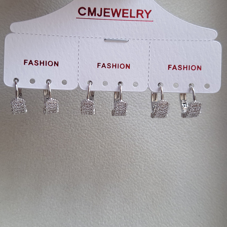 گوشواره حلقهای جواهری نگیندار مدل لوکس | رنگ نقرهای برند CM JEWELRY